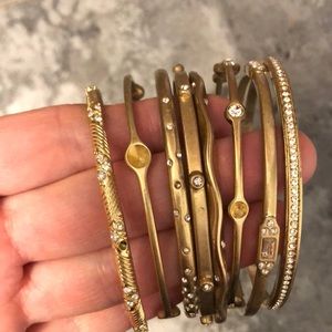8 Lia Sophia gold bangles